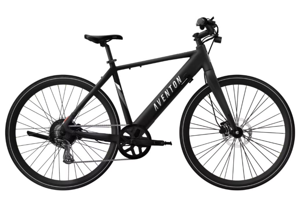 Black electric bicycle with thick tires and a rear hub motor, shown on a white background