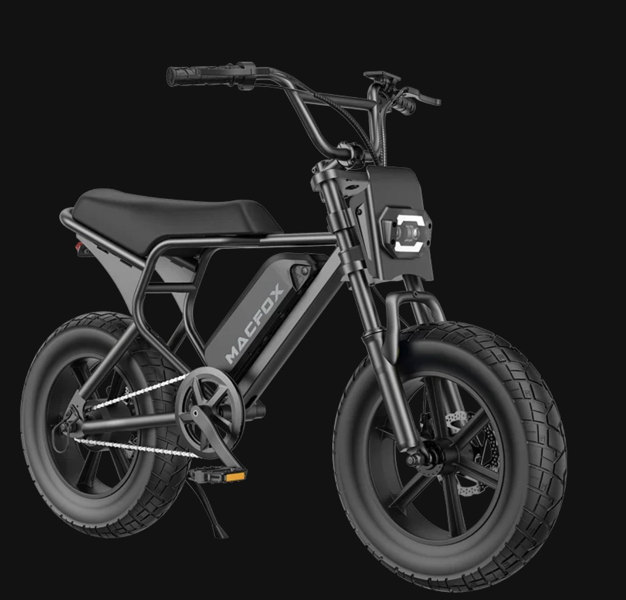 Black electric fat-tire bike on a dark background, shown in three-quarter view