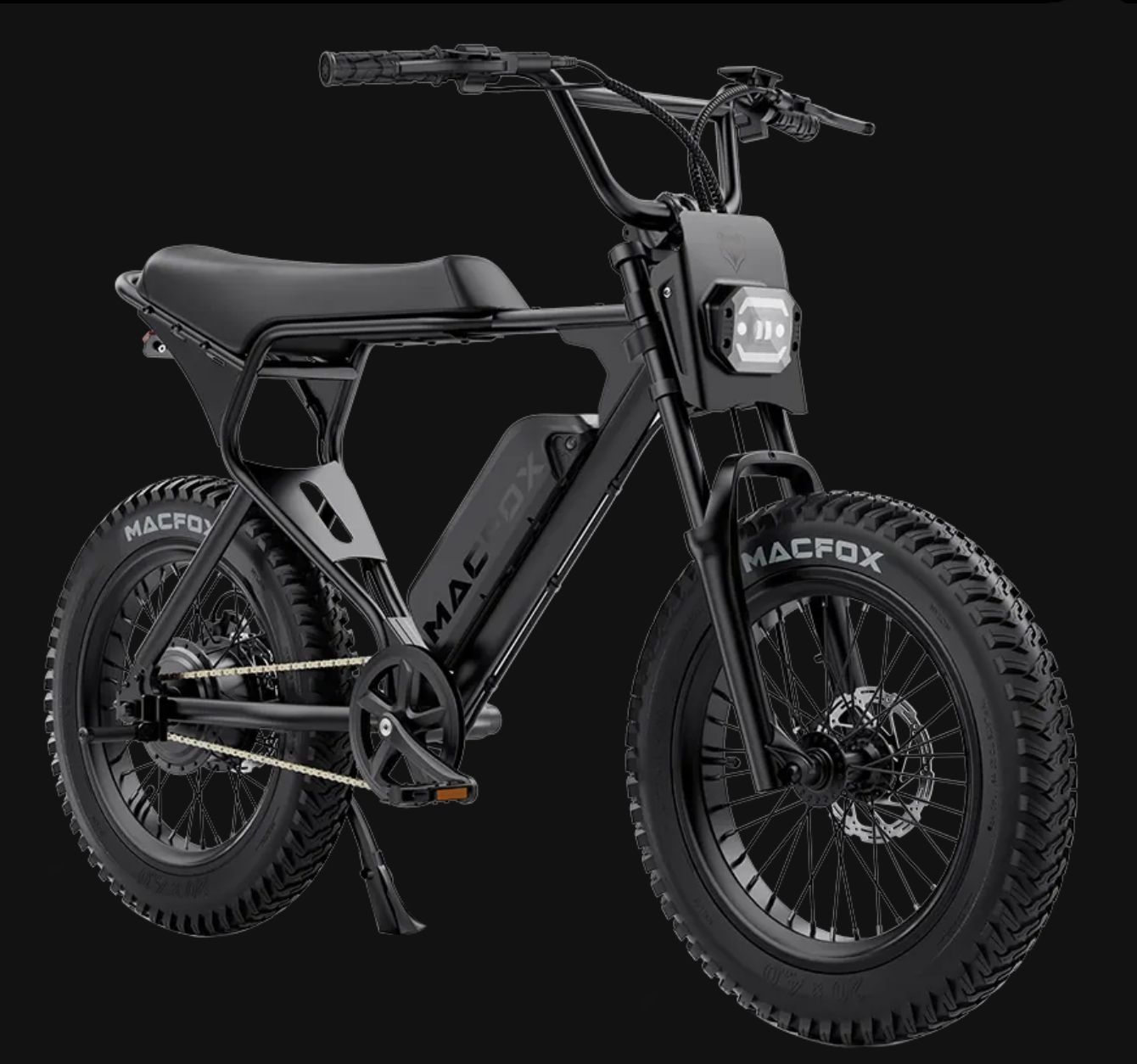 Black electric off-road bike with chunky tires on a dark background