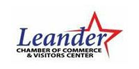 Leander Chamber of Commerce & Visitors Center logo with blue text and red star