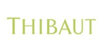 Green text reading “THIBAUT” on a white background