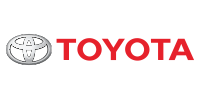 Toyota logo: a silver emblem next to the word TOYOTA in red.