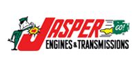 Logo of Jasper Engines & Transmissions with a cartoon man welding on the letter “J”.