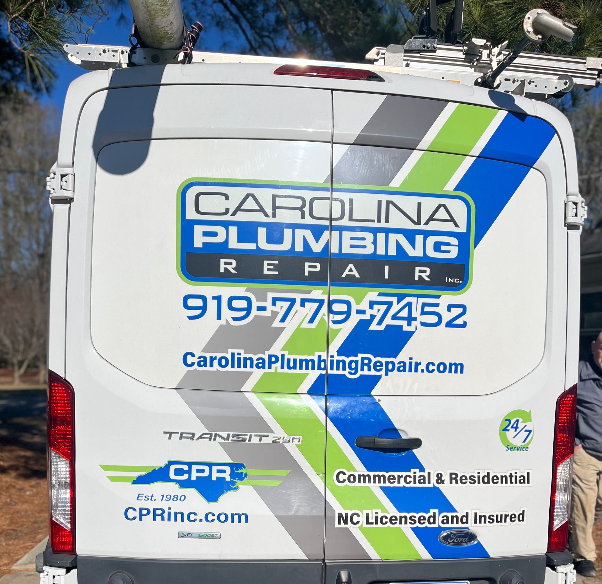 The back of a carolina plumbing repair van