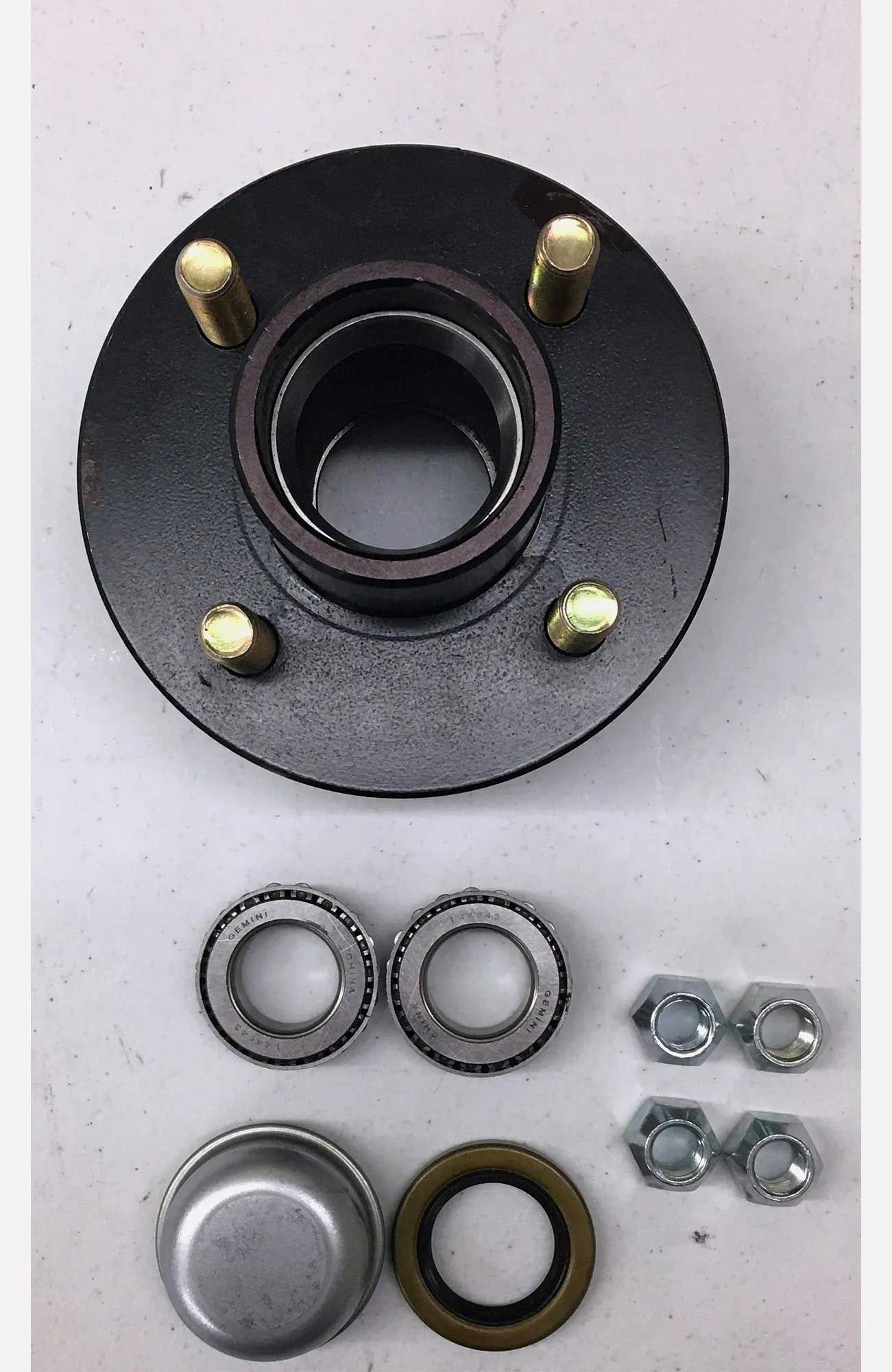 Black trailer hub with bearings, seals, and lug nuts on a white background.