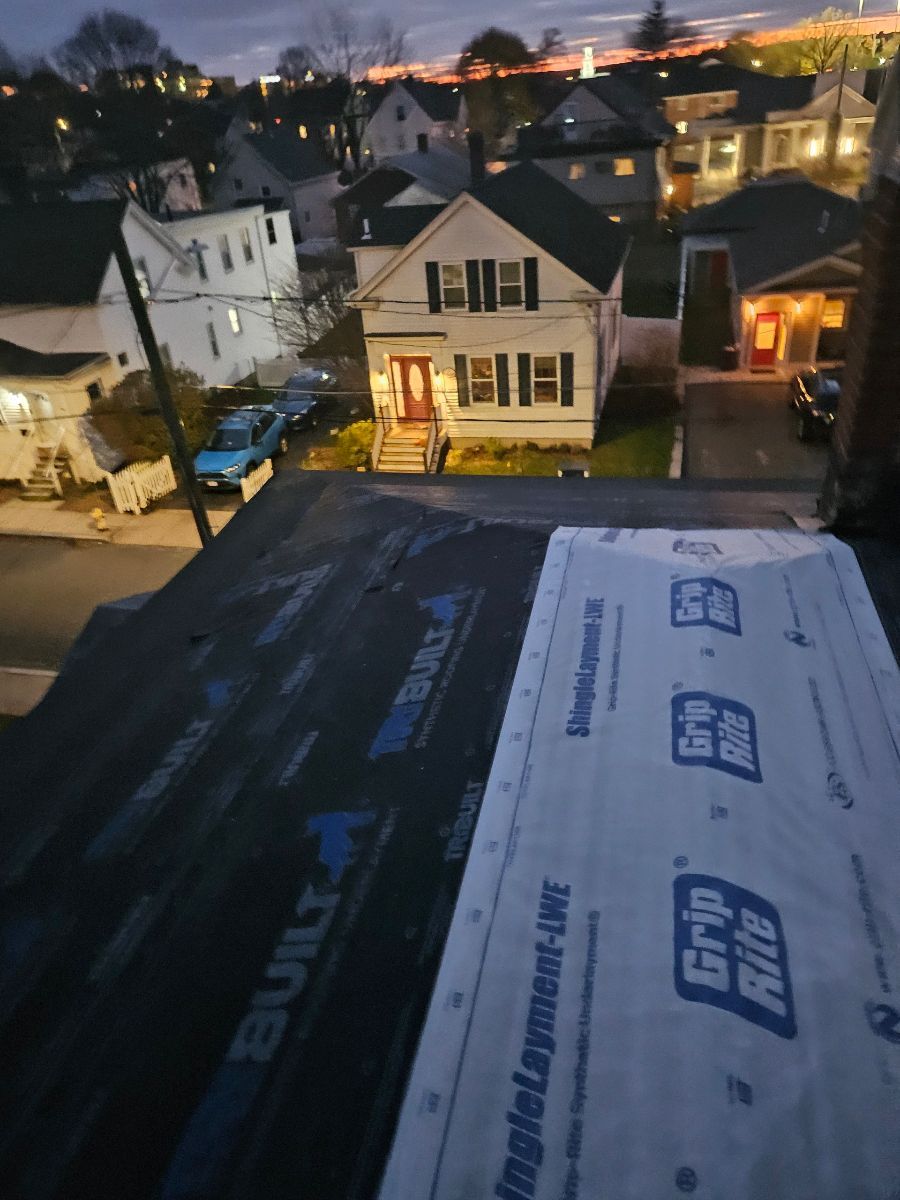 A roof with a roofing material that says grip rite on it