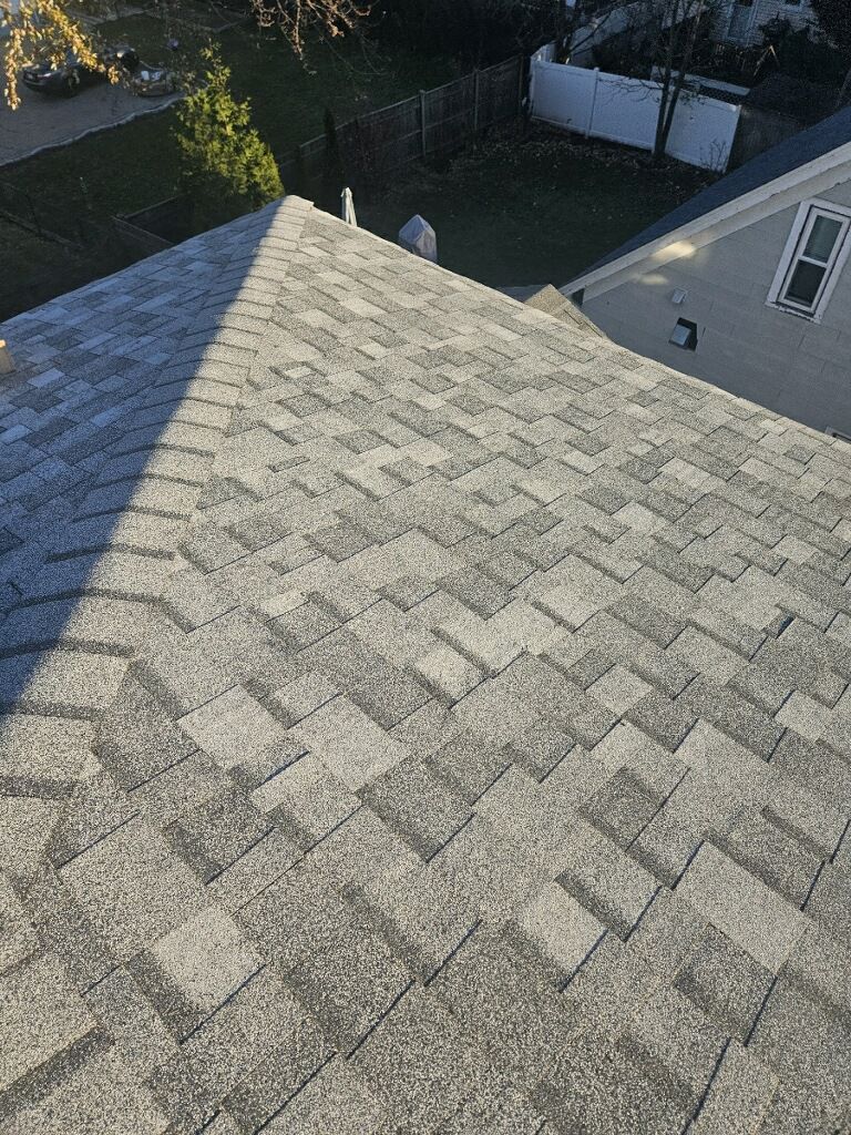 A close up of a roof with shingles on it.