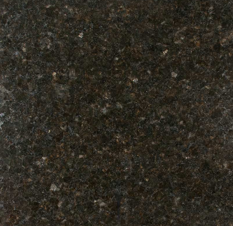 A close up of a black granite counter top