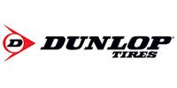 Dunlop Tires logo in black and red on a white background