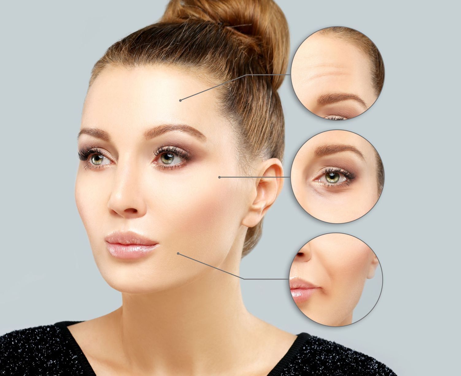 A woman is getting a botox injection in her forehead.