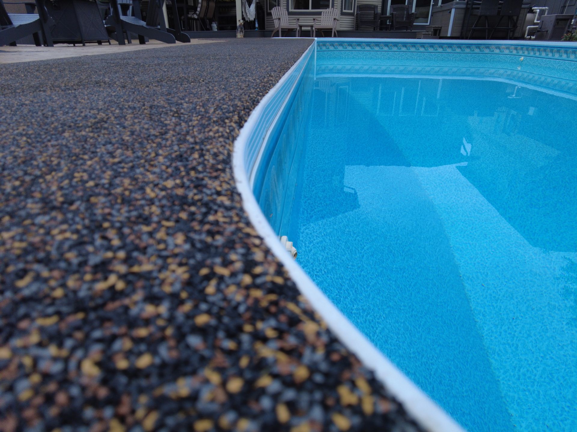 A close up of a swimming pool with a white border.