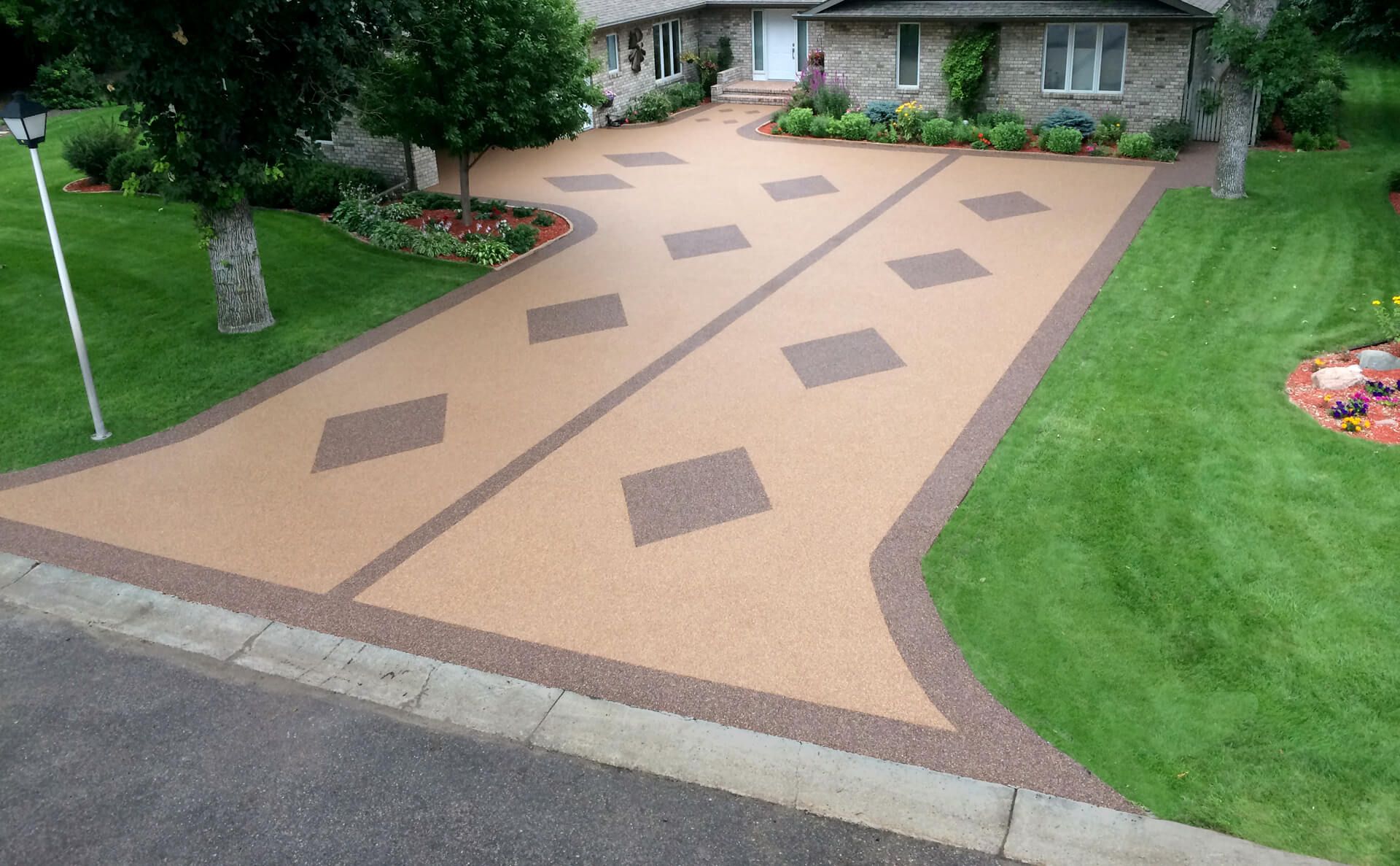 A driveway that looks like a road with squares on it.