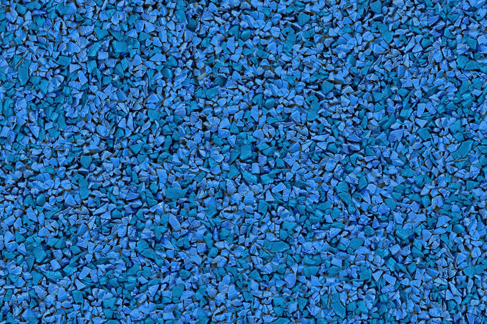 A close up of a pile of blue gravel.