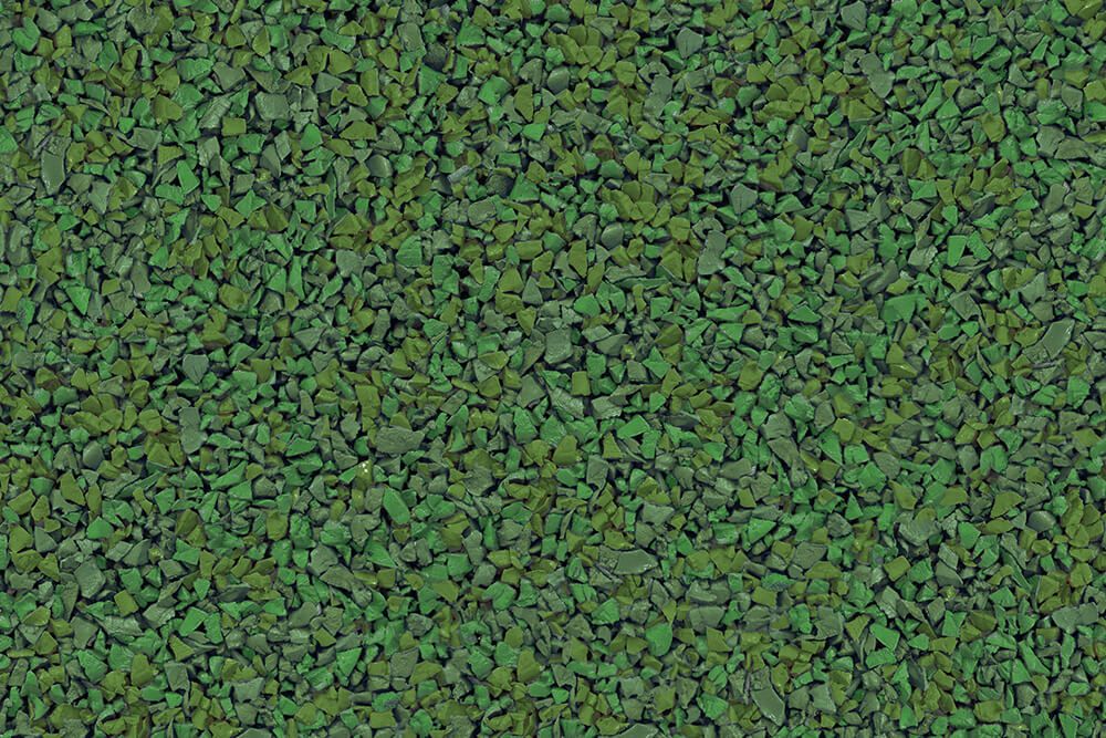 A close up of a pile of green gravel.