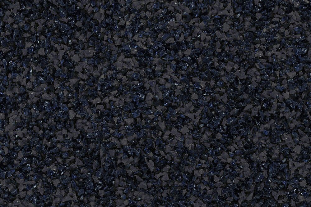 A close up of a pile of black gravel.