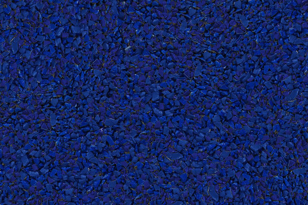A close up of a pile of blue gravel.
