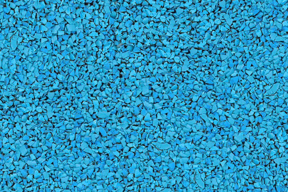 A close up of a pile of blue gravel.