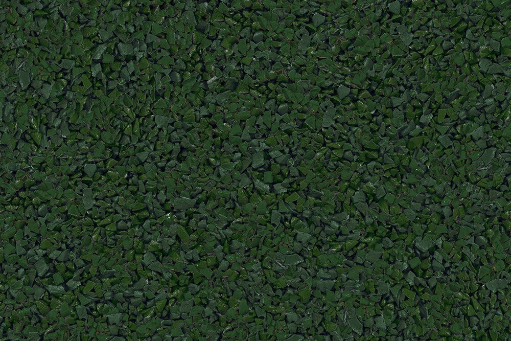 A close up of a pile of green gravel.