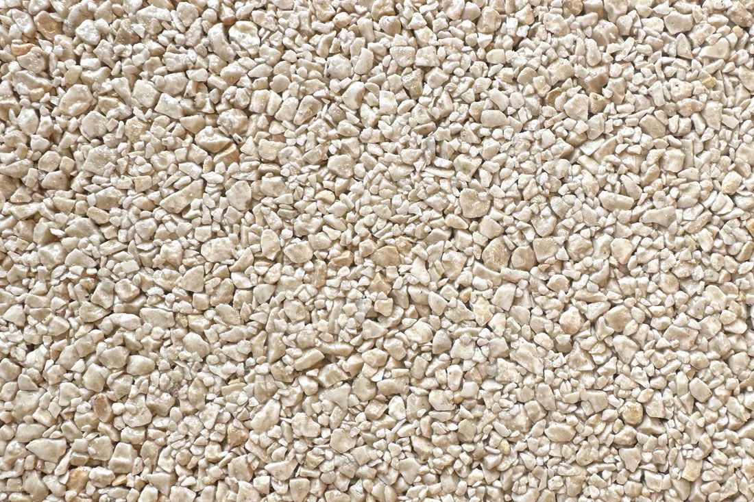 A close up of a pile of white gravel.
