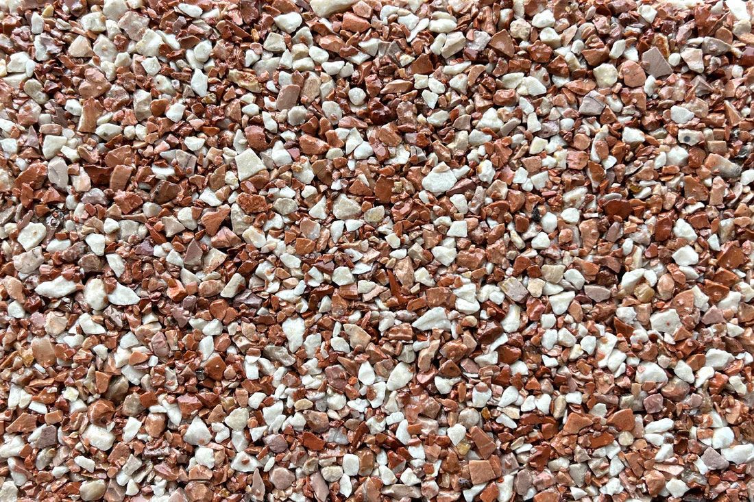 A close up of a pile of brown and white gravel.