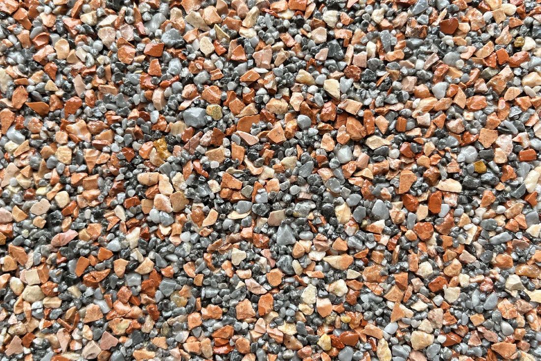 A close up of a pile of gravel and bricks.