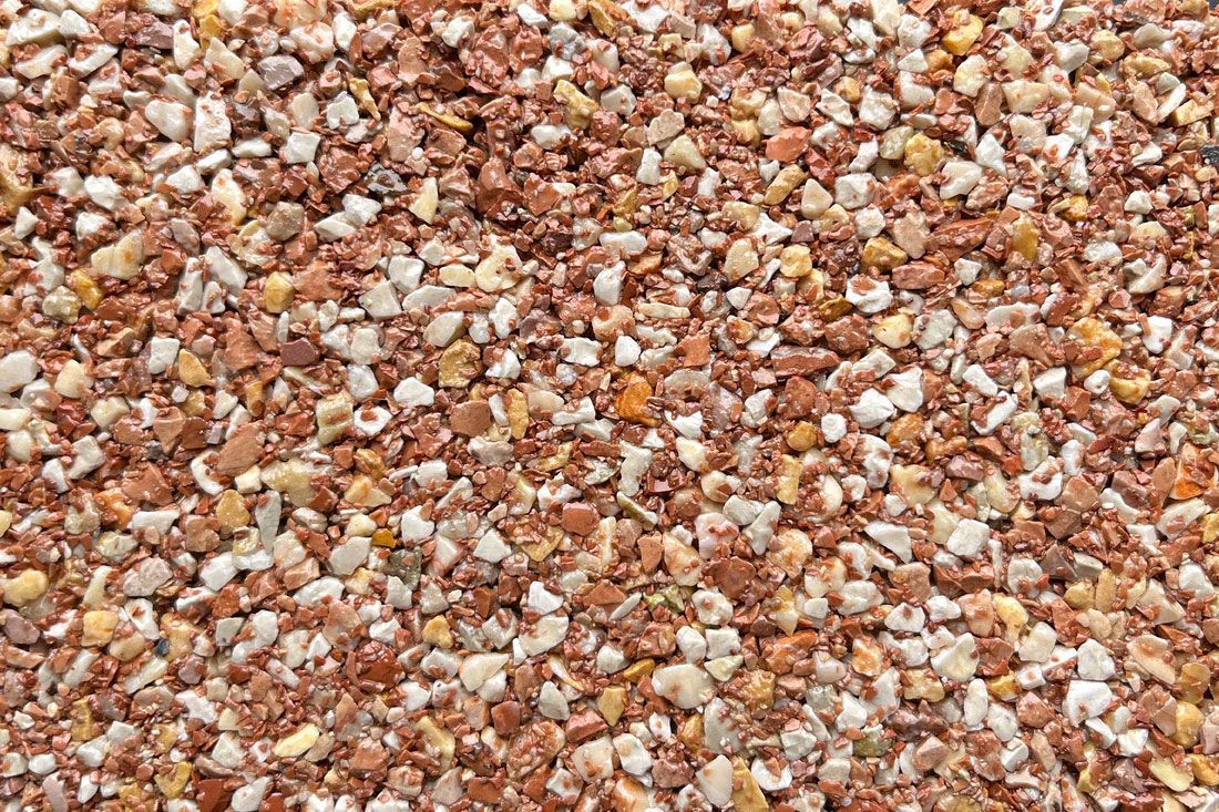 A close up of a pile of brown and white gravel.