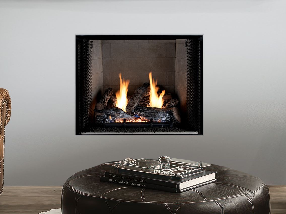 Fireplace with burning logs, built into a white wall. Dark logs with orange flames. Black framing, dark ottoman.