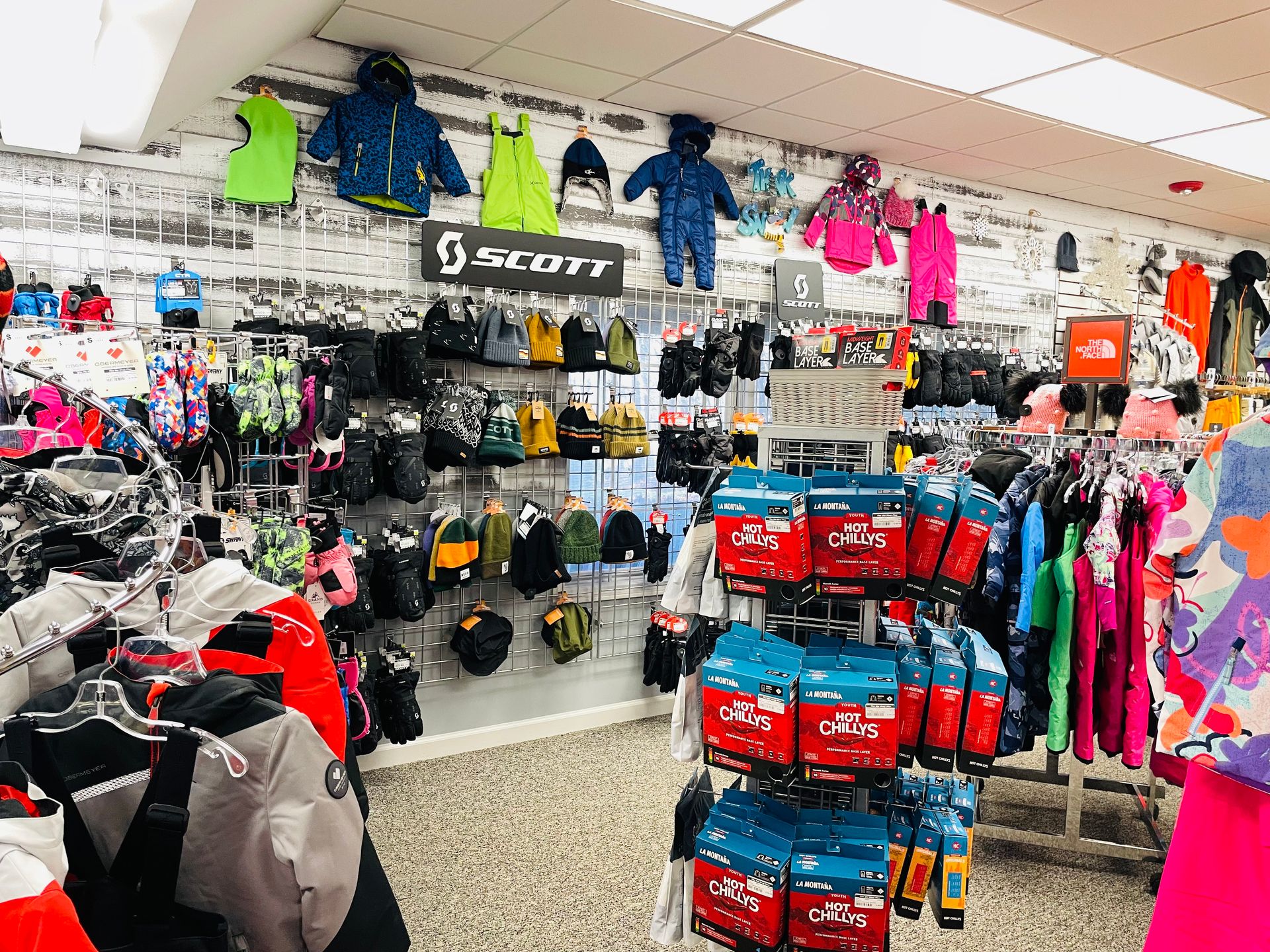 A store filled with lots of clothes and hats.