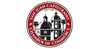San Juan Capistrano Chamber of Commerce logo: red ring around a church illustration with text.
