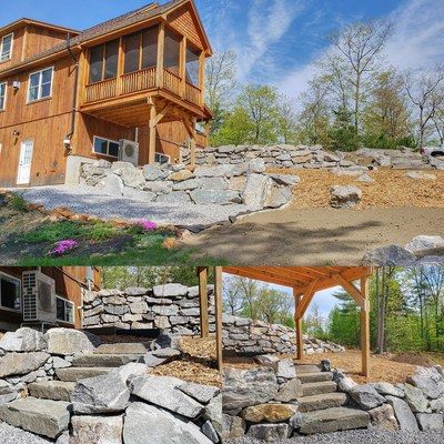 Wooden house with stone retaining walls, steps, and a gazebo in a wooded setting.