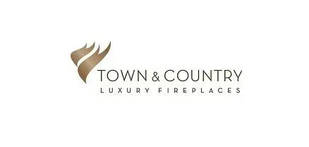 Logo for Town & Country Luxury Fireplaces, featuring a flame-like symbol and text.