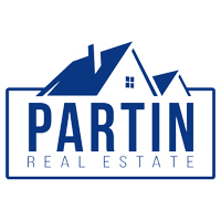 Partin Real Estate logo. Blue stylized house silhouette with white text on a blue rectangular background.