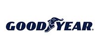Goodyear logo in navy blue with winged foot icon on a white background
