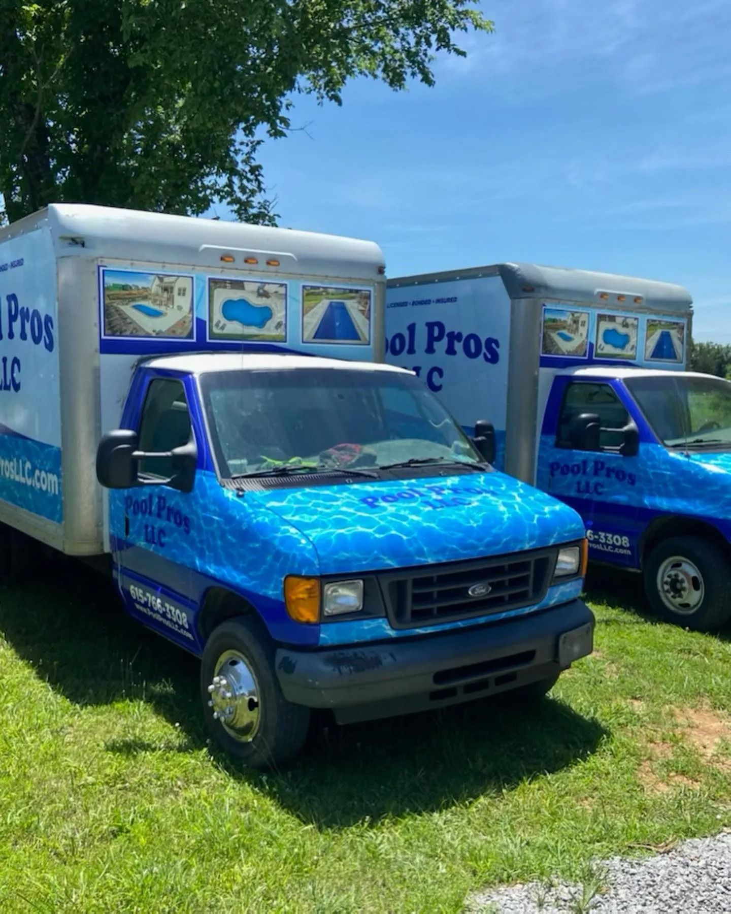 Two box trucks branded 