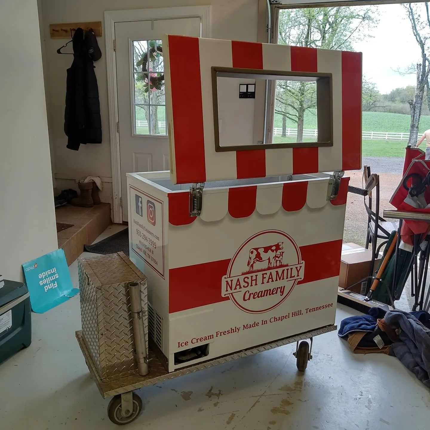 An ice cream cart branded 