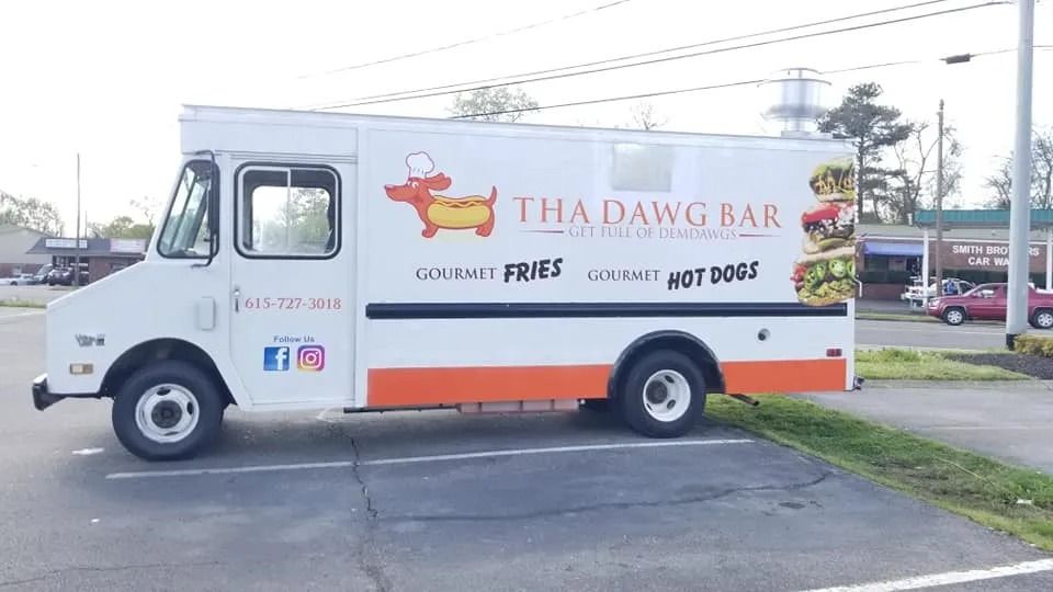A white food truck named 