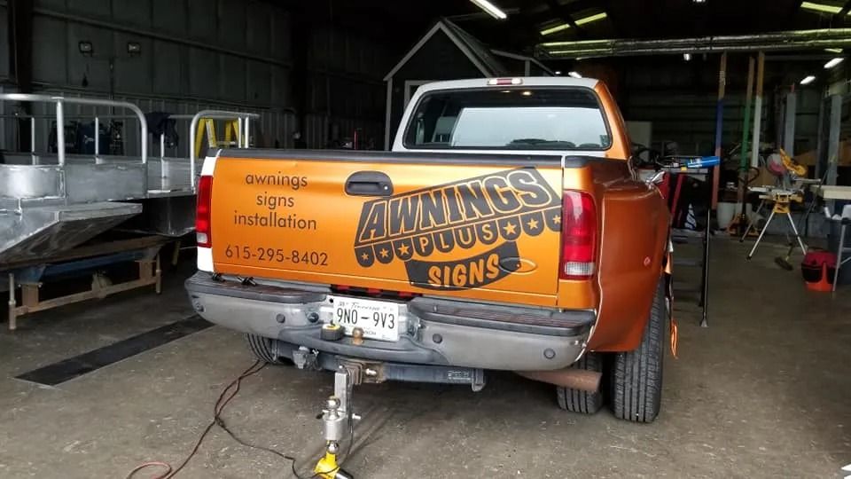 A metallic orange truck with 