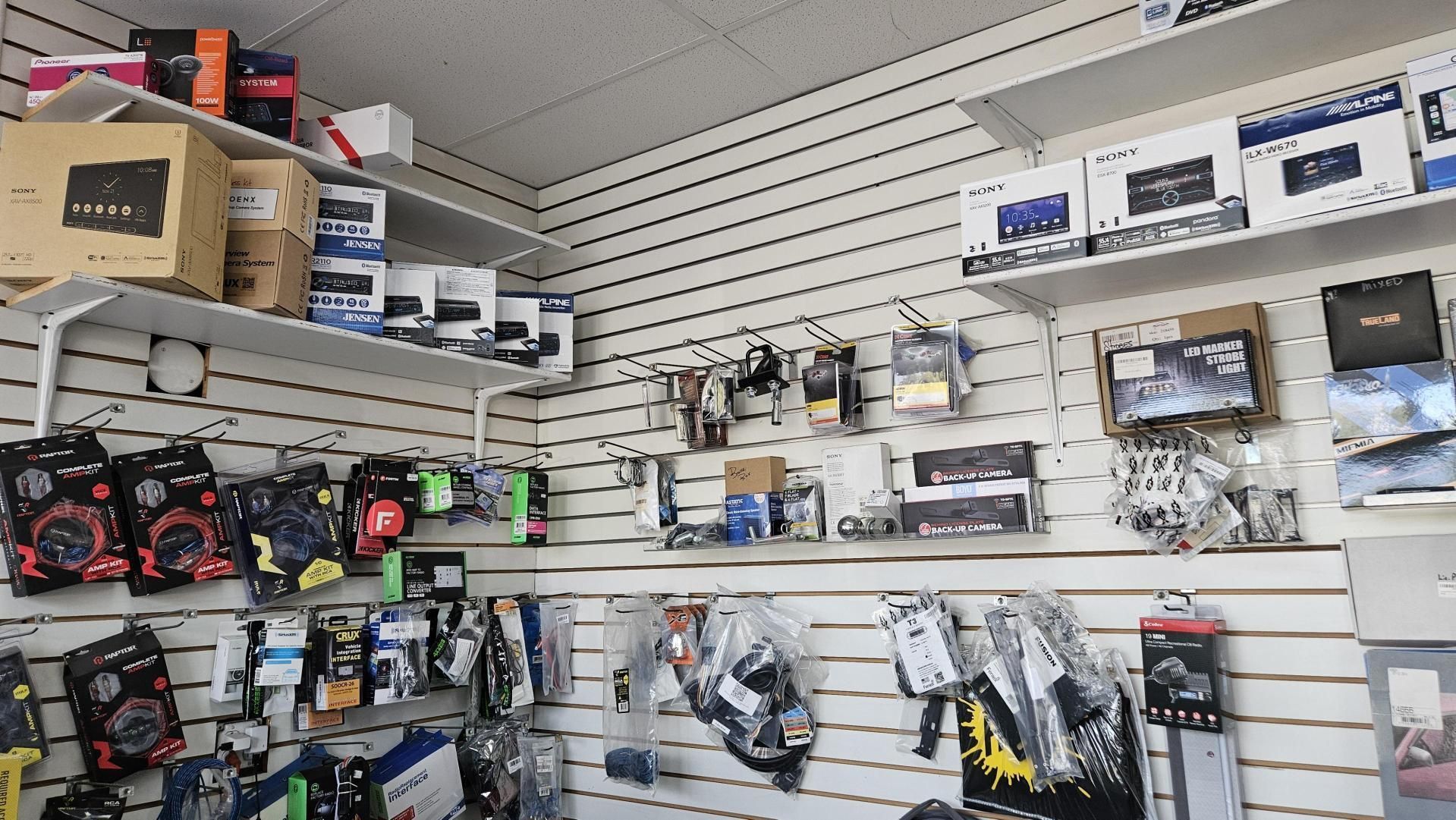 A store filled with lots of tools and boxes on shelves.