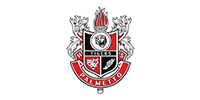 Palmetto High School emblem, red, black and white crest with torch and text, 