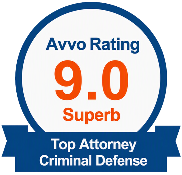 Avvo rating badge: 9.0 SuperB, top attorney for criminal defense, in blue and white.