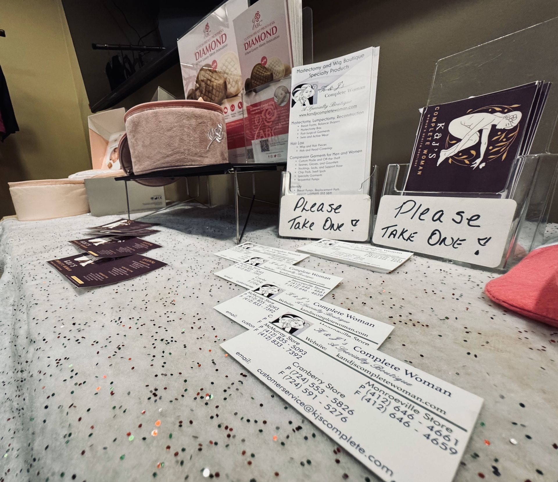 A table with a sign that says please take out