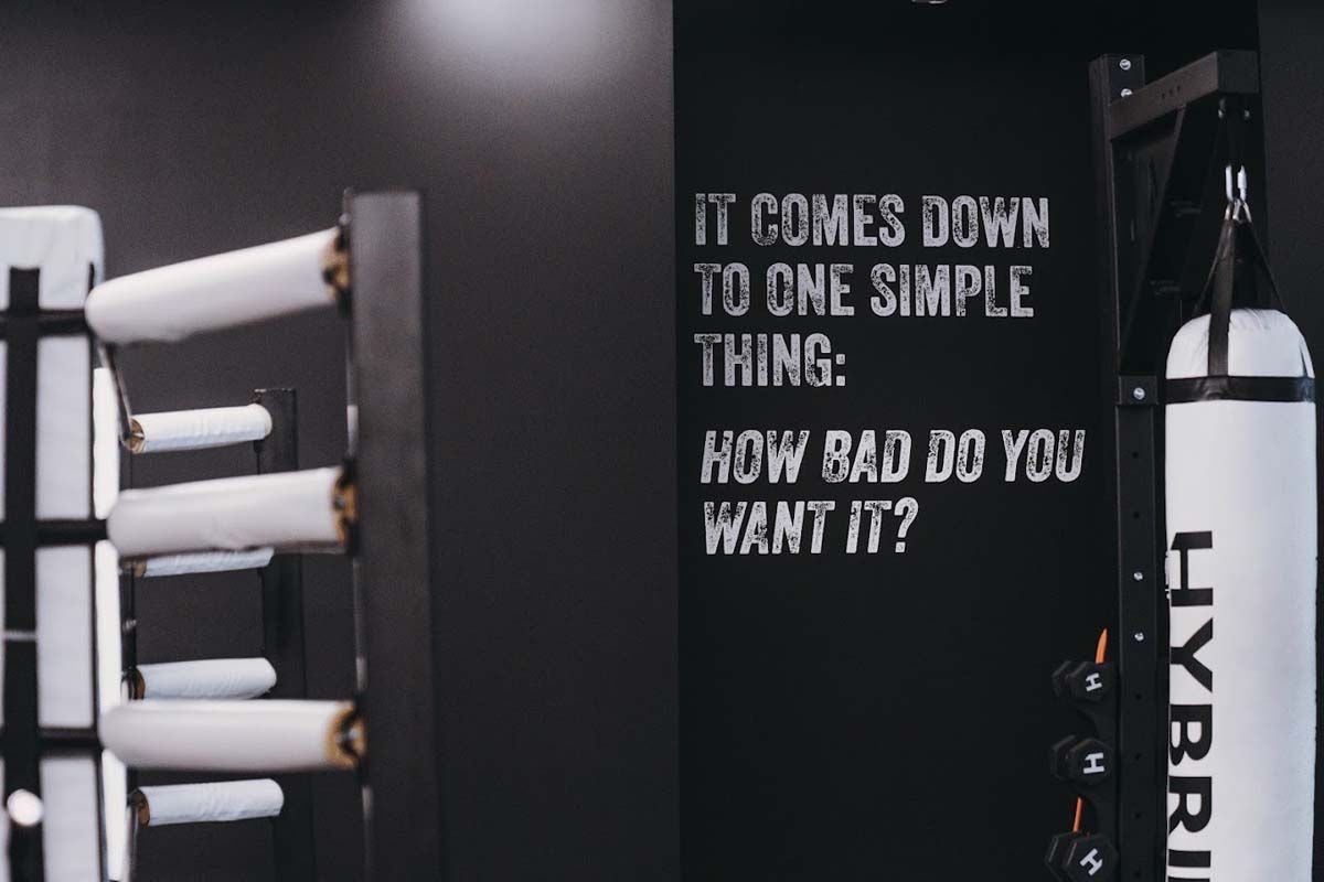 A boxing ring with a sign that says it comes down to one simple thing