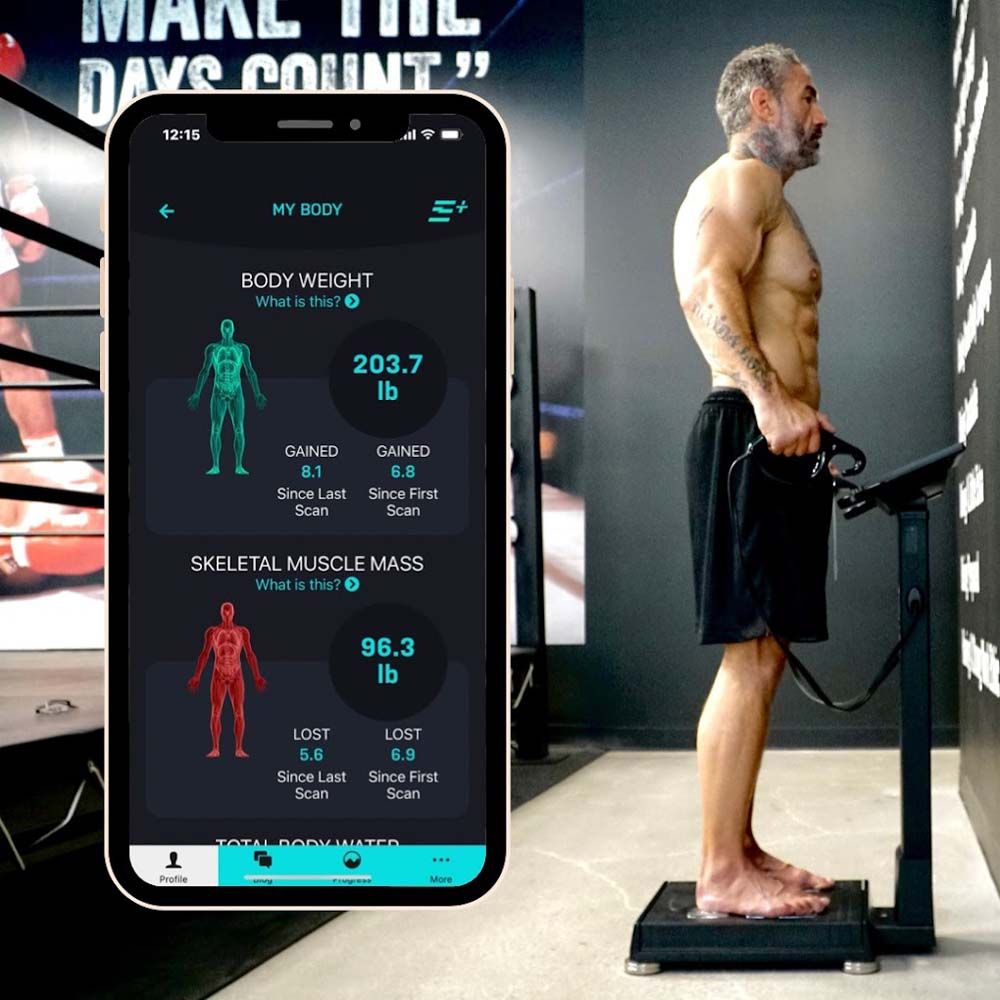 A man standing on a scale next to a phone that says make the days count