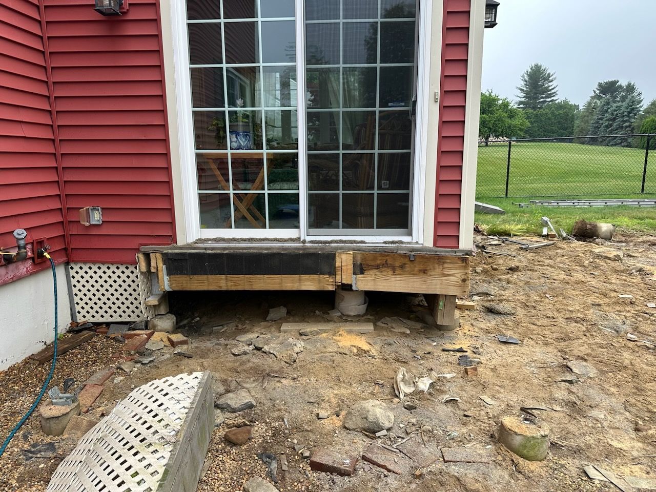 A red house with a sliding glass door