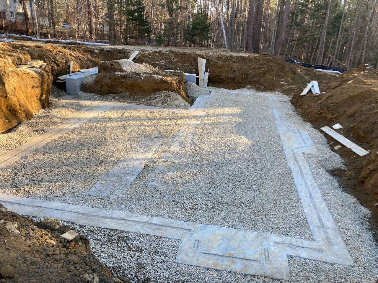A construction site with a lot of dirt and gravel.