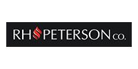 RH Peterson co. logo, white text on black background, stylized red flame icon.