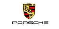 Porsche crest and wordmark in black, red, gold, and white