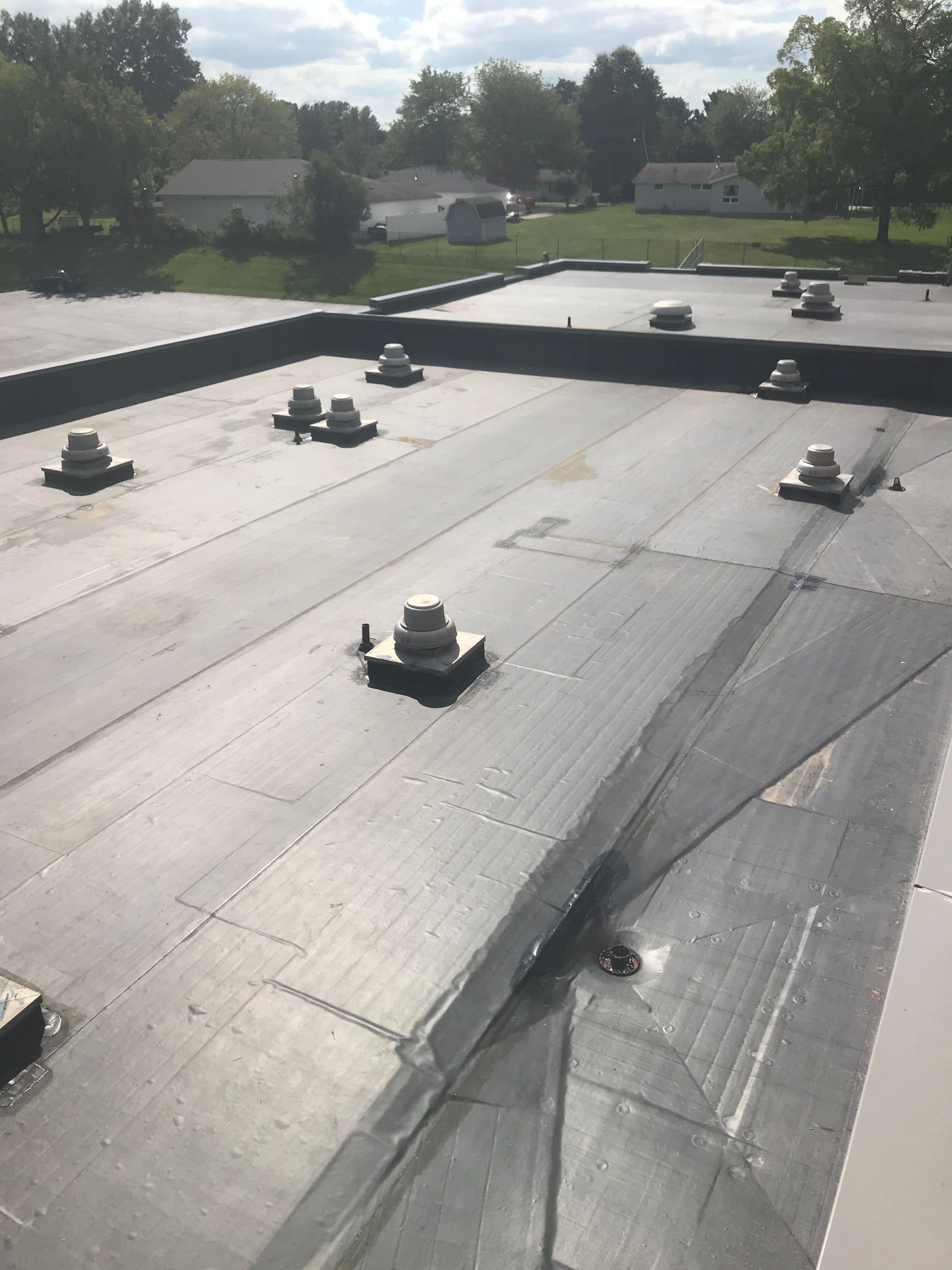 A roof with a lot of vents on it