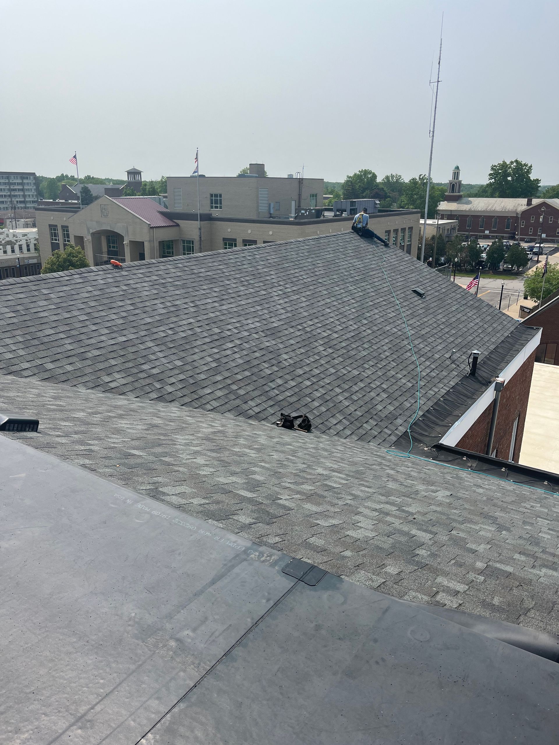 The roof of a building with a lot of shingles on it.
