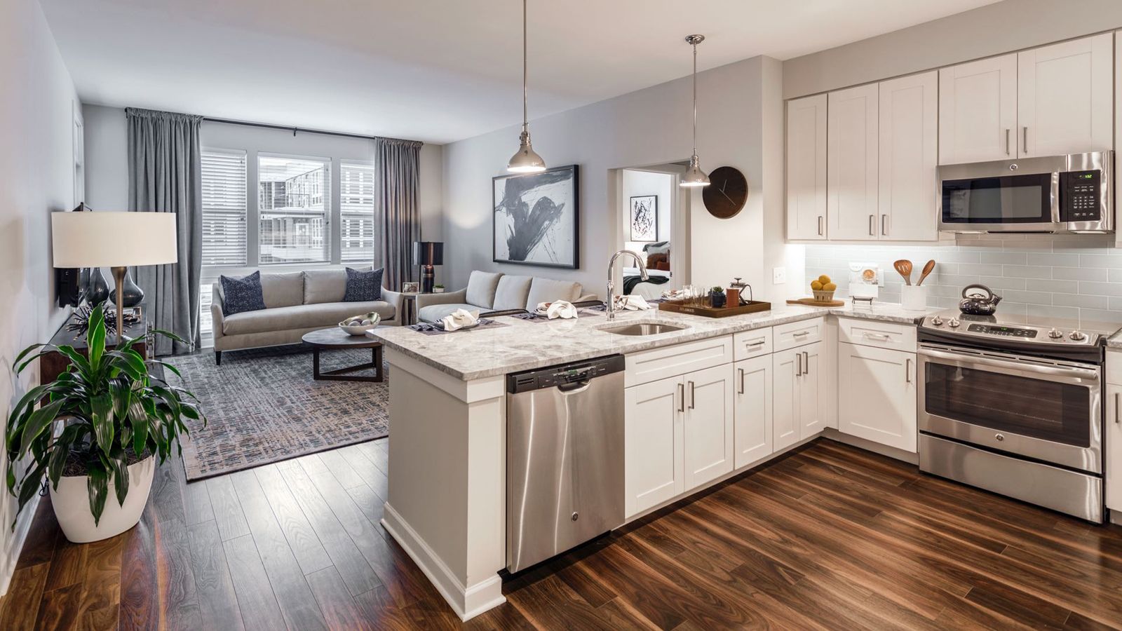 Senior apartment with a modern open-concept living room kitchen island.